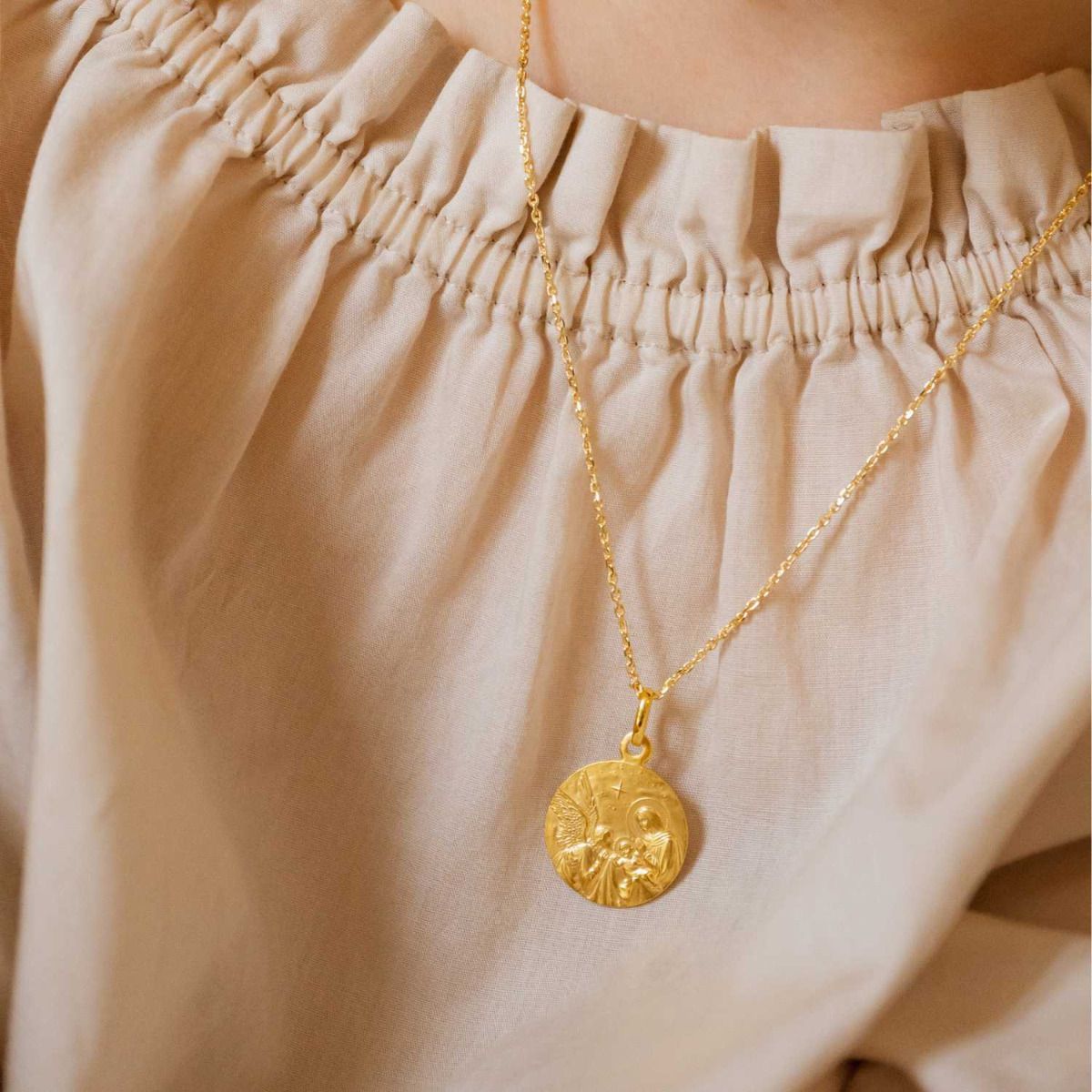 médaille baiser d'ange en or